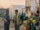 Farmer employer shakes hands with a new hire at a small Azerbaijani farm as